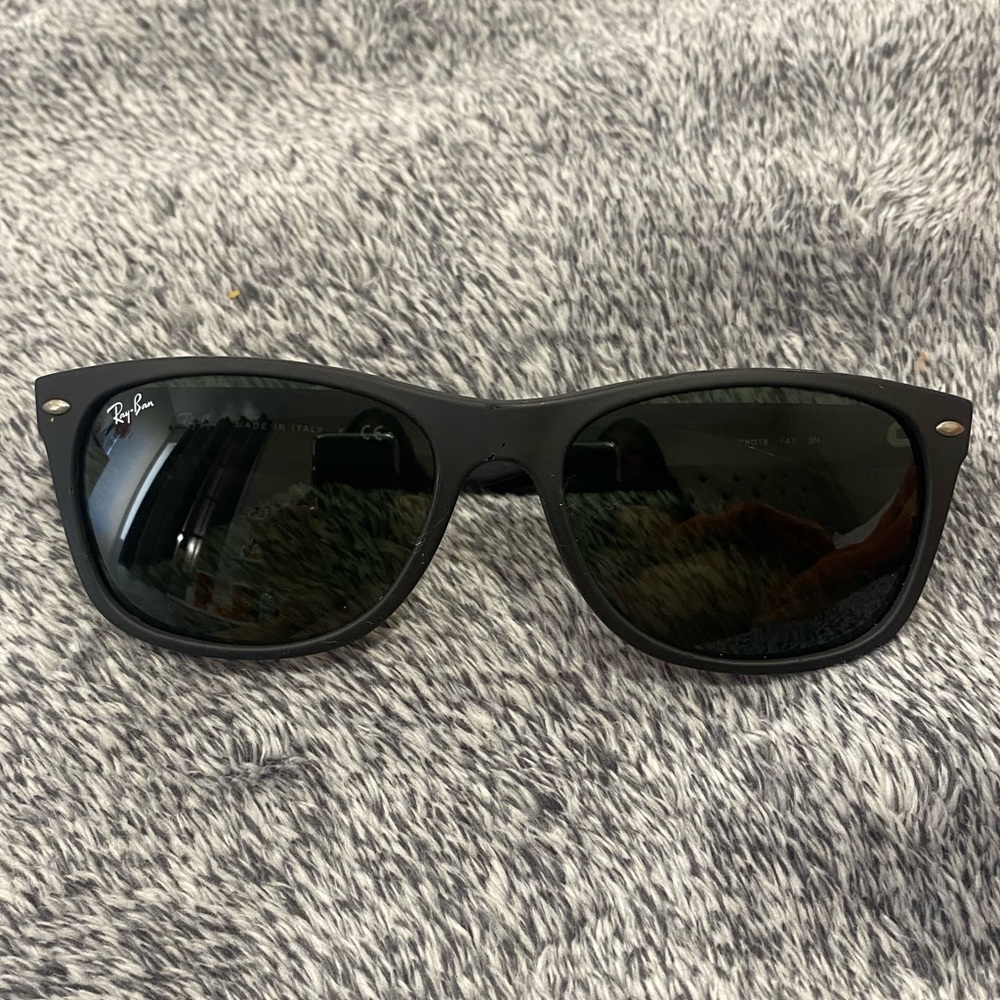 Used Ray Bans. In good shape. Barely used. Style name is New Wayfarer.